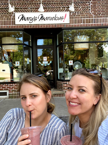 Weekend in The Hamptons: Two girls with smoothies in front of Marvelous Mary's in East Hampton, New York