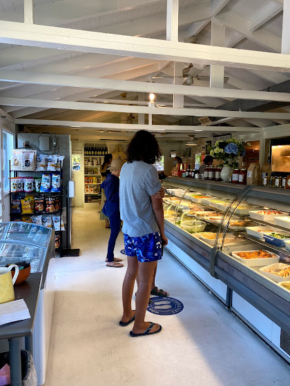 Weekend in The Hamptons: Inside Loaves and Fishes sign in East Hampton, New York