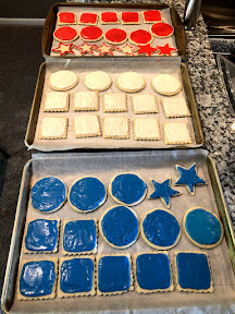 Red, white and blue frosted cookies