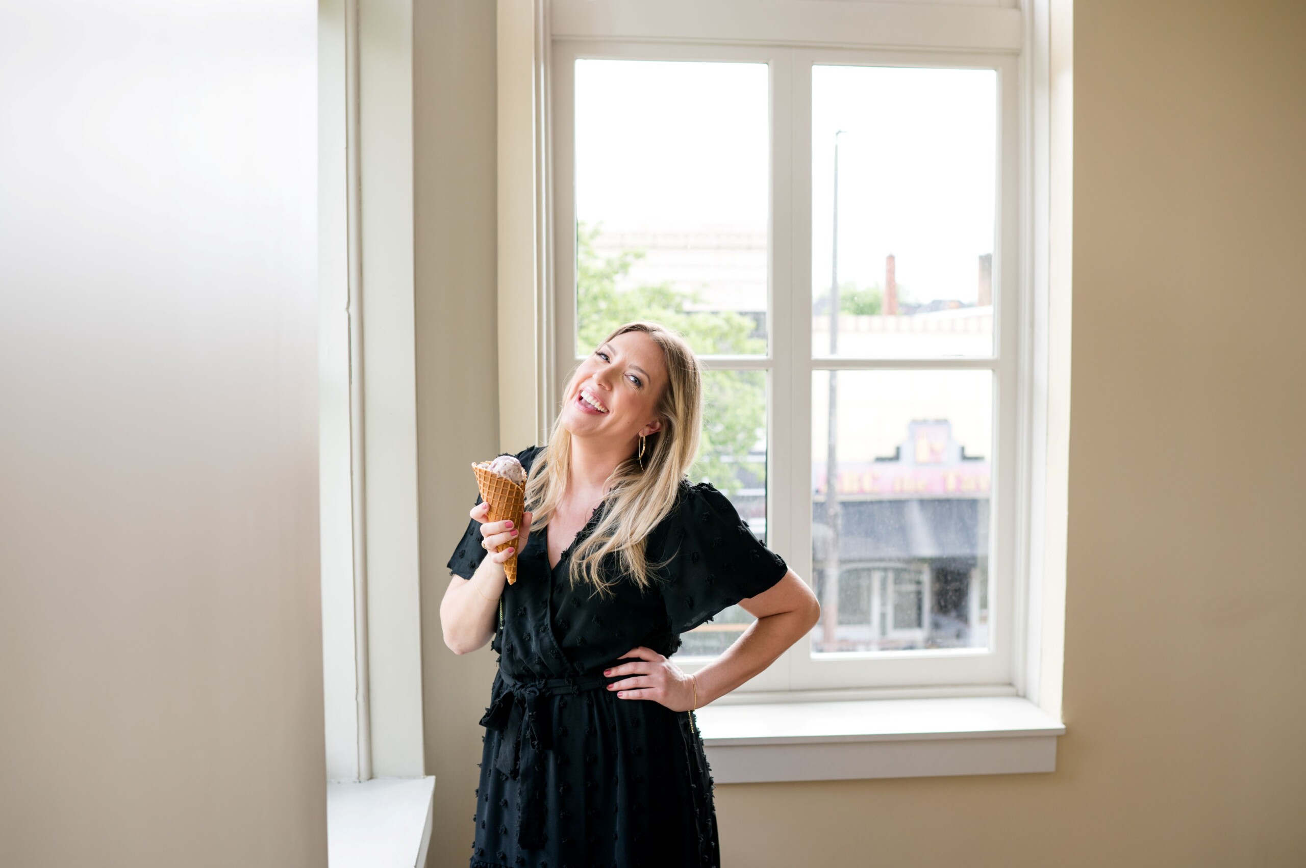 Darcy Warden holding an ice cream cone during a Being Darcy branding session