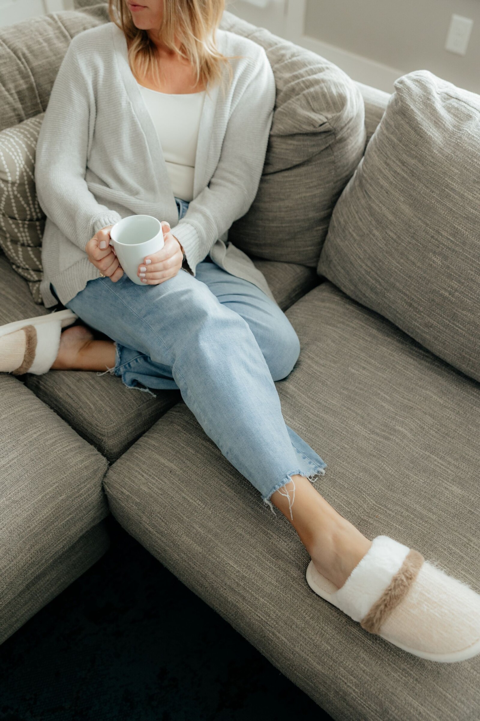 Business owner relaxing at home with a cup of coffee